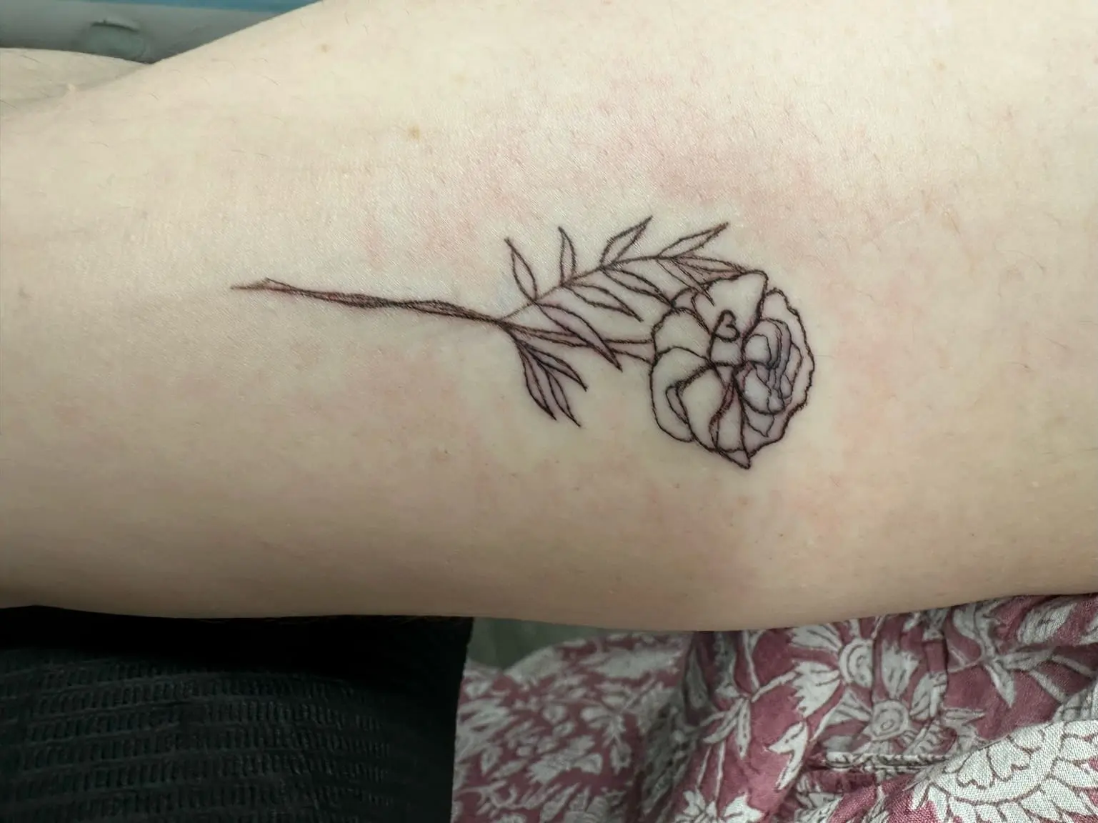 fine line floral tattoo